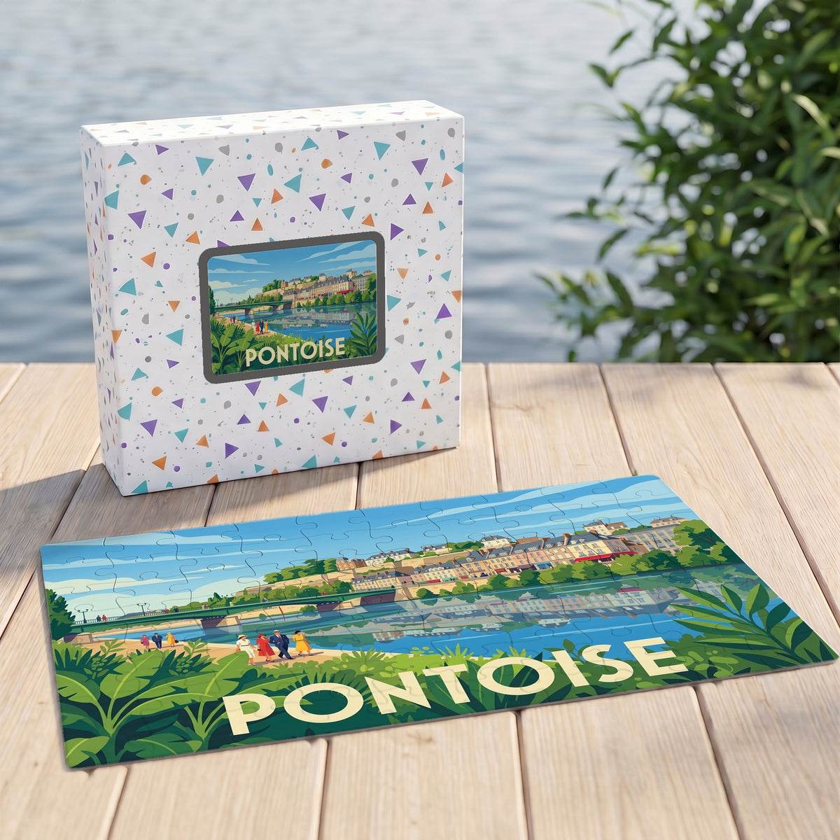Puzzle souvenir de la ville de Pontoise avec une illustration stylisée et sa boîte assortie.