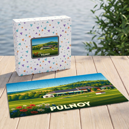 Puzzle souvenir de la ville de Pulnoy avec une illustration stylisée d'un paysage verdoyant.