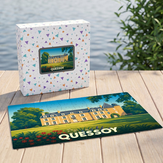 Puzzle souvenir de la ville de Quessoy illustré d'un château avec son emballage assorti.