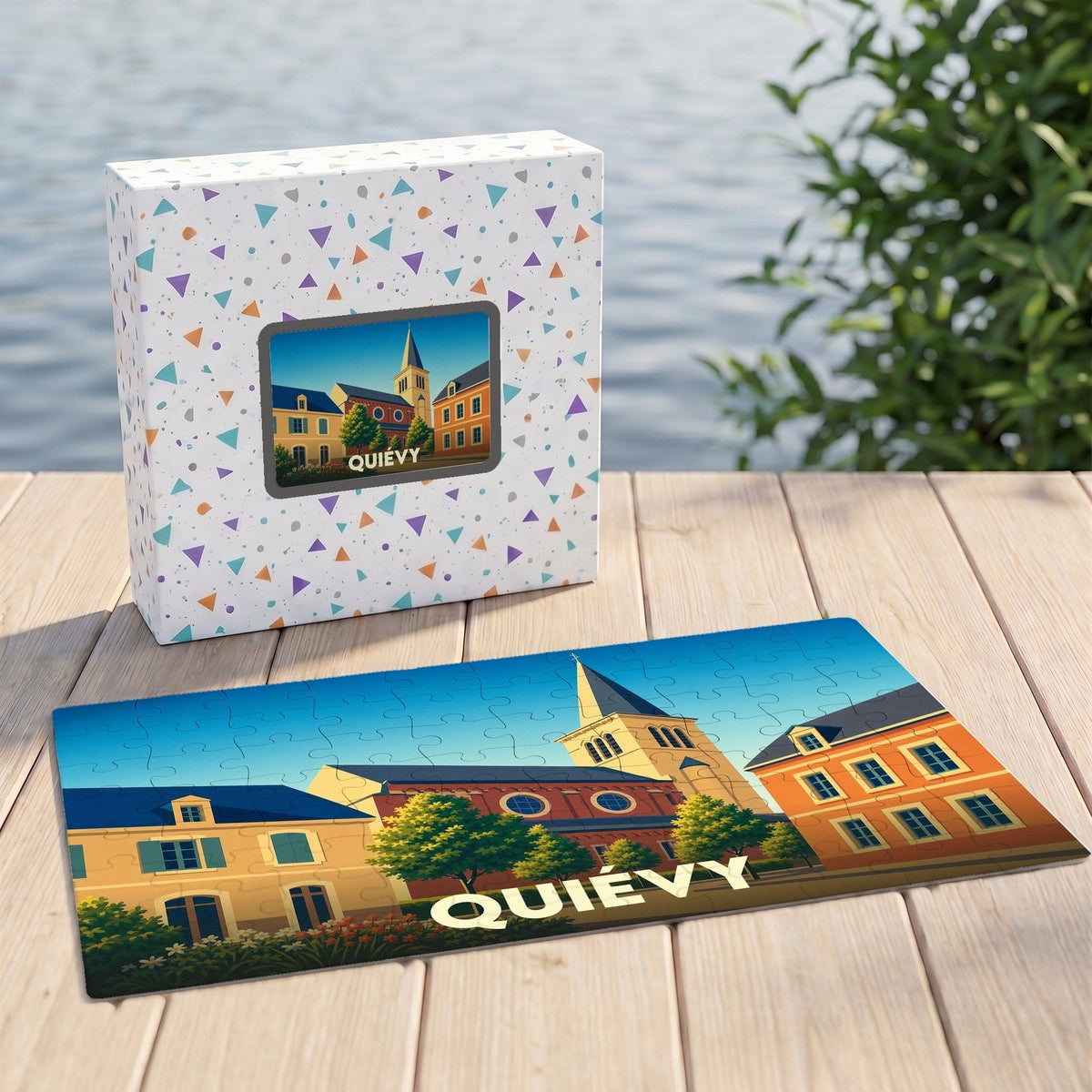 Puzzle souvenir de la ville de Quiévy avec une illustration colorée de son église et de ses maisons typiques.