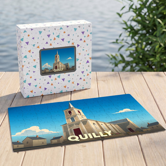 Puzzle souvenir de la ville de Quilly avec une illustration stylisée d'une église sur fond de ciel bleu.