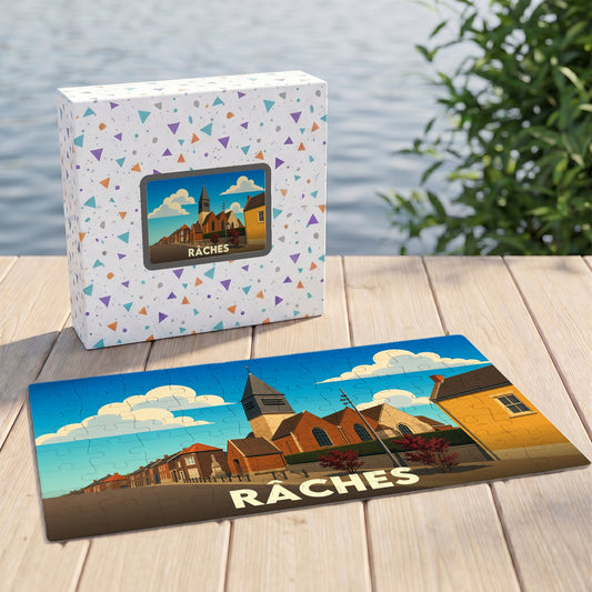 Puzzle souvenir de la ville de Râches avec une illustration stylisée de son église et de ses maisons.