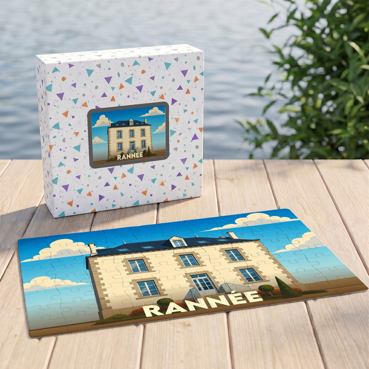Puzzle souvenir de la ville de Rannée avec une illustration stylisée d'une maison de maître.