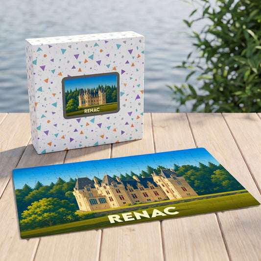 Puzzle souvenir de la ville de Renac représentant un château illustré, présenté avec sa boîte assortie.