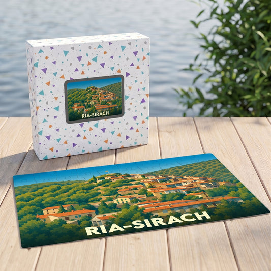 Puzzle souvenir de la ville de Ria-Sirach avec une illustration stylisée d'un village perché.