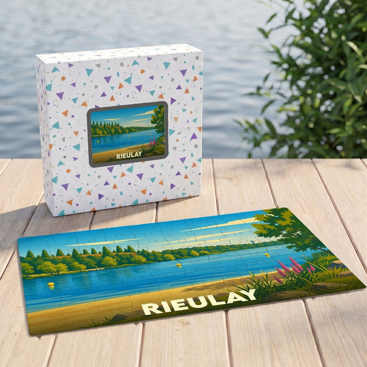 Puzzle souvenir de la ville de Rieulay avec une illustration stylisée d'un paysage de lac.