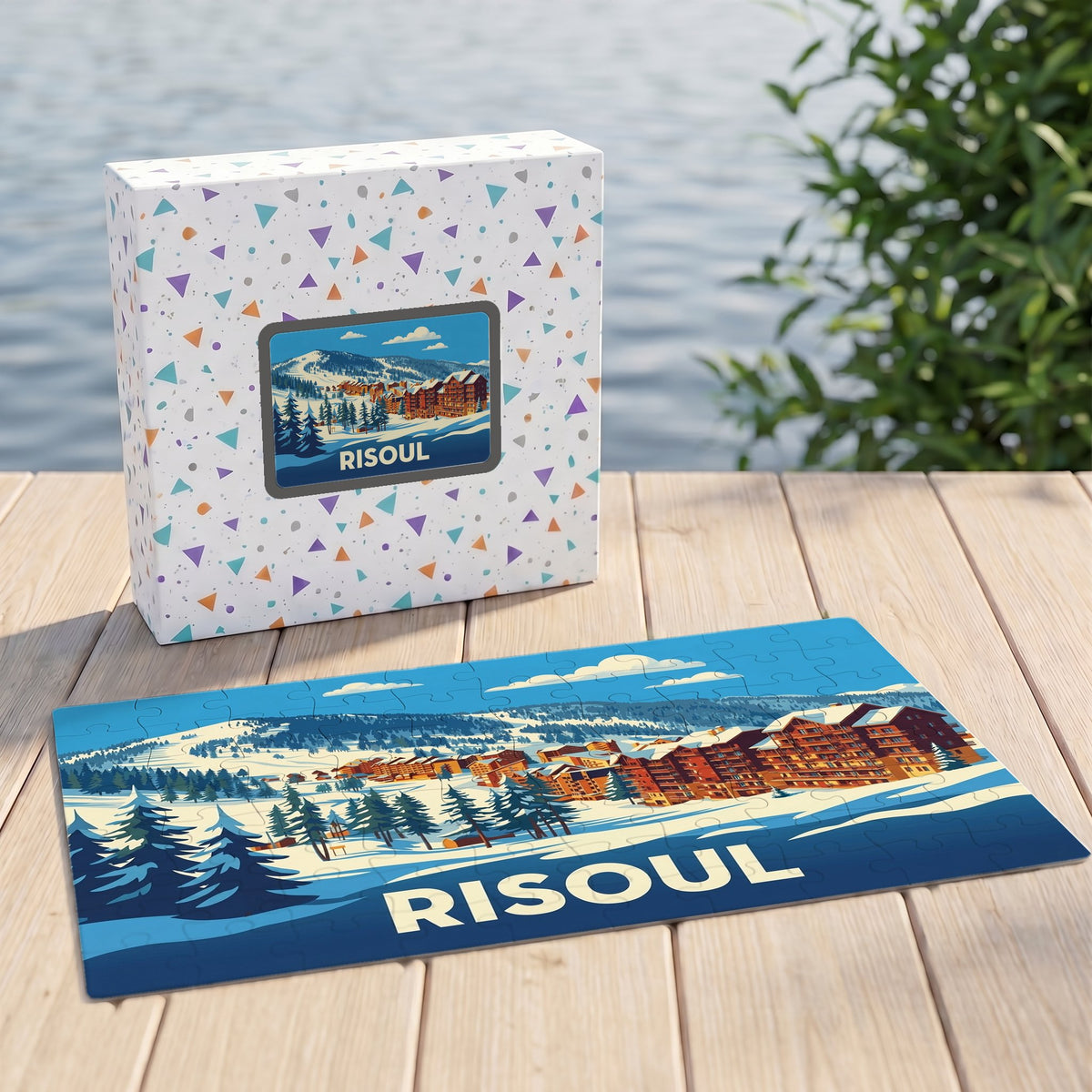 Puzzle souvenir de la ville de Risoul illustré d'un paysage de montagne enneigé et de ses chalets.