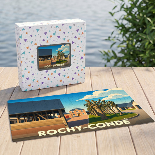 Puzzle souvenir de la ville de Rochy-Condé avec une illustration stylisée d'un paysage urbain.