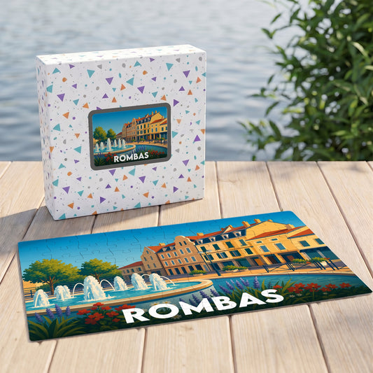 Puzzle souvenir de la ville de Rombas avec une illustration stylisée d'une fontaine et de bâtiments colorés.
