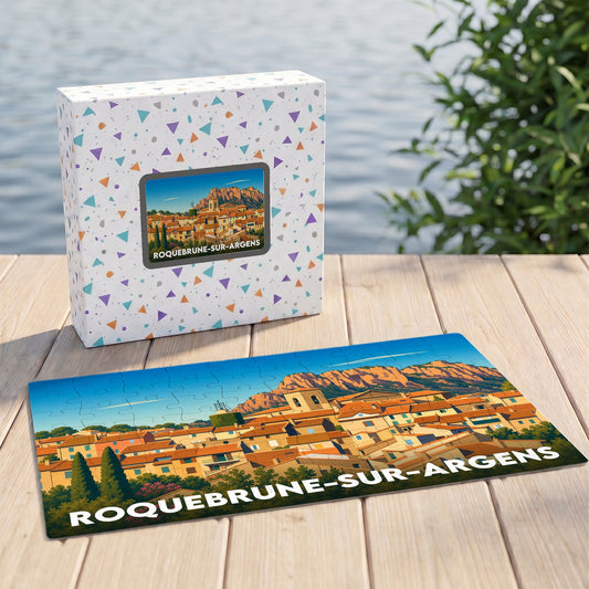 Puzzle souvenir de la ville de Roquebrune-sur-Argens avec une illustration colorée et stylisée de ses toits provençaux.