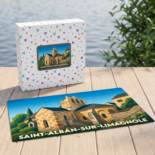 Puzzle souvenir de la ville de Saint-Alban-sur-Limagnole avec son illustration stylisée et sa boîte assortie.