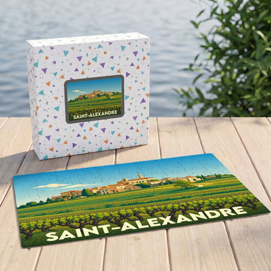 Puzzle souvenir de la ville de Saint-Alexandre représentant un paysage de vignobles et son village.