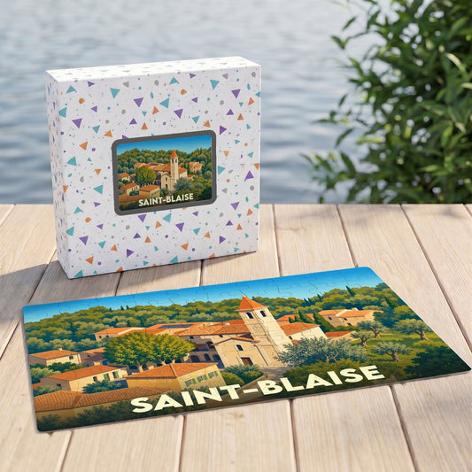 Puzzle souvenir de la ville de Saint-Blaise avec une illustration stylisée d'un village provençal.