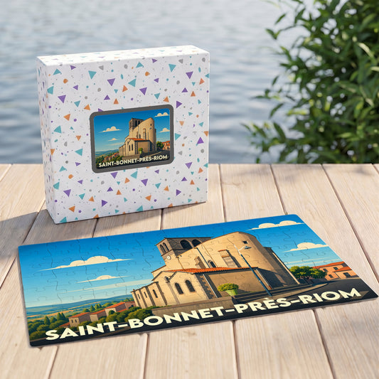 Puzzle souvenir de la ville de Saint-Bonnet-près-Riom avec une illustration stylisée de son église.