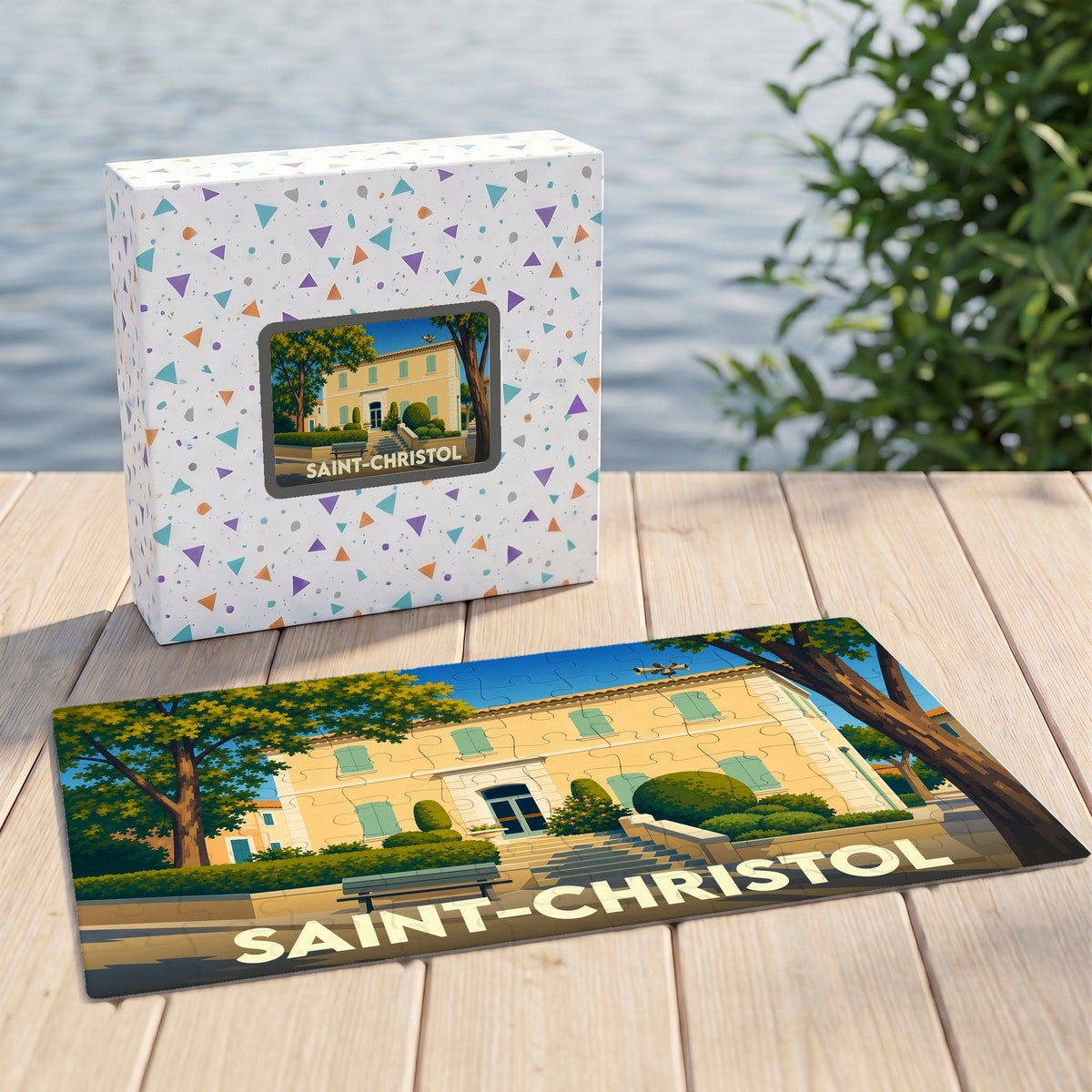 Puzzle souvenir de la ville de Saint-Christol avec une illustration stylisée d'un bâtiment provençal.