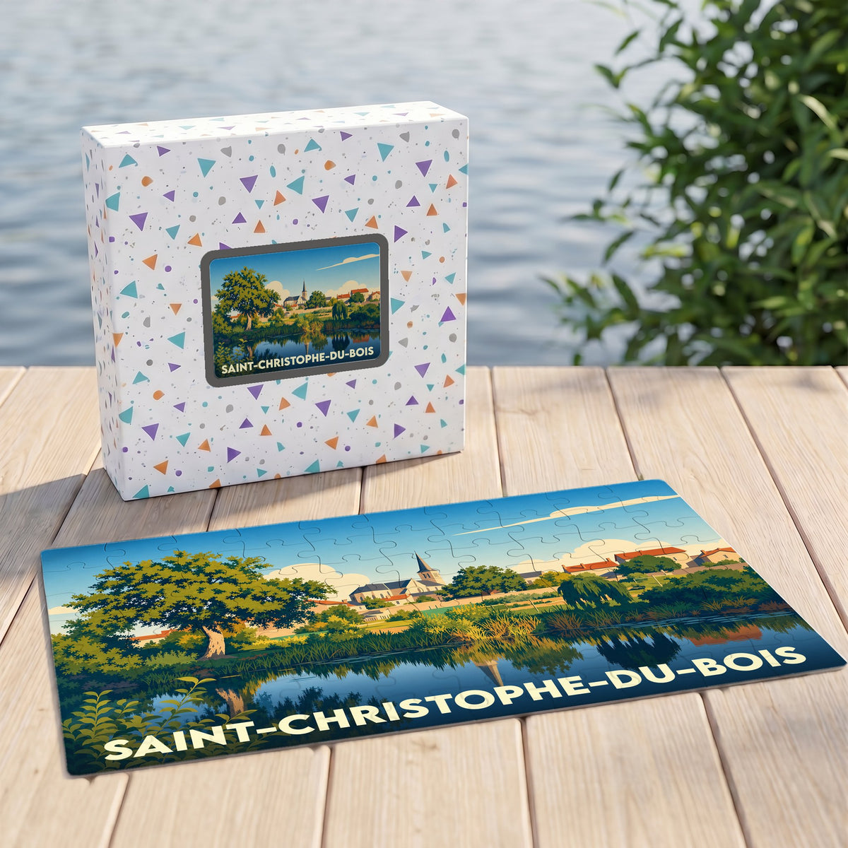 Puzzle souvenir de la ville de Saint-Christophe-du-Bois avec une illustration stylisée de son paysage et de son église.
