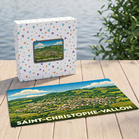 Puzzle souvenir de la ville de Saint-Christophe-Vallon avec une illustration panoramique et colorée.