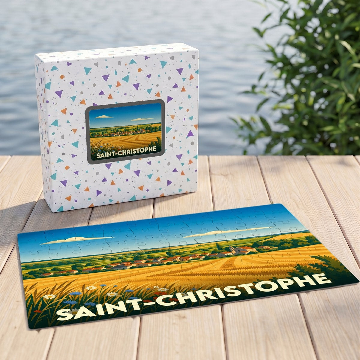 Puzzle souvenir de la ville de Saint-Christophe illustrant un paysage champêtre stylisé.