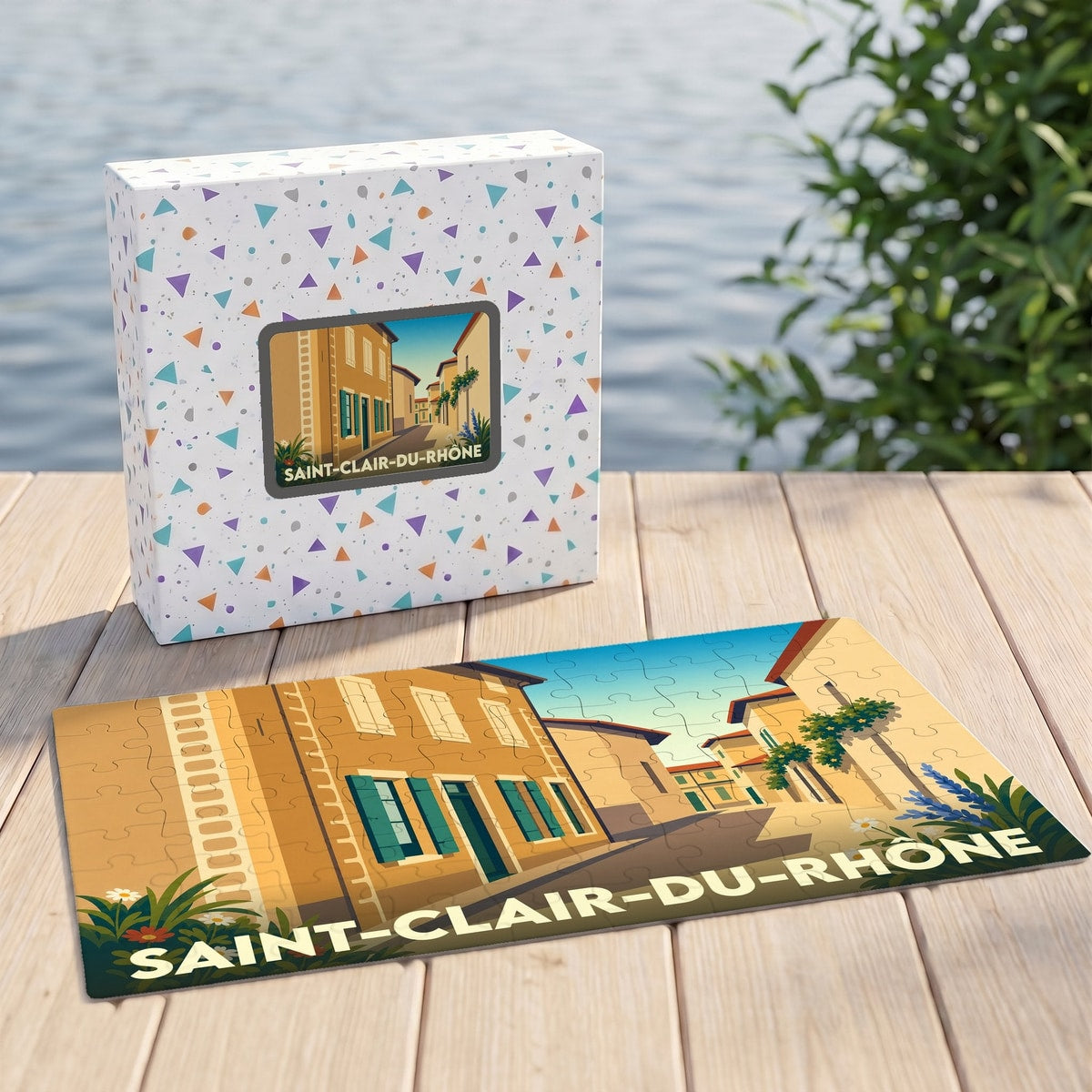 Puzzle souvenir de la ville de Saint-Clair-du-Rhône avec une illustration stylisée et sa boîte assortie.