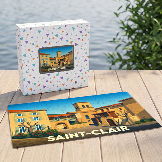 Puzzle souvenir de la ville de Saint-Clair avec une illustration stylisée d'un village méditerranéen.