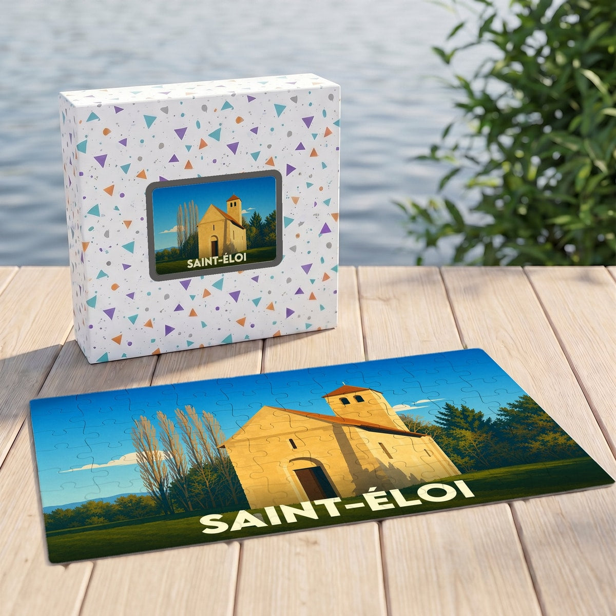Puzzle souvenir de la ville de Saint-Éloi avec une illustration stylisée d'une église sous un ciel bleu.