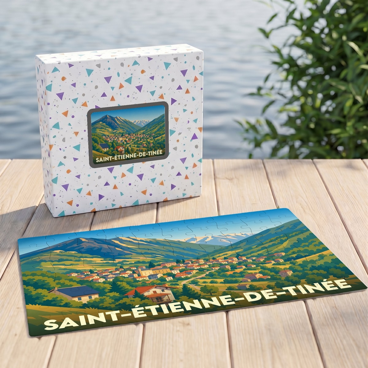 Puzzle souvenir de la ville de Saint-Étienne-de-Tinée avec une illustration de paysage de montagne.