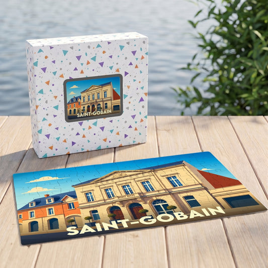 Puzzle souvenir de la ville de Saint-Gobain avec une illustration stylisée d'un bâtiment historique.