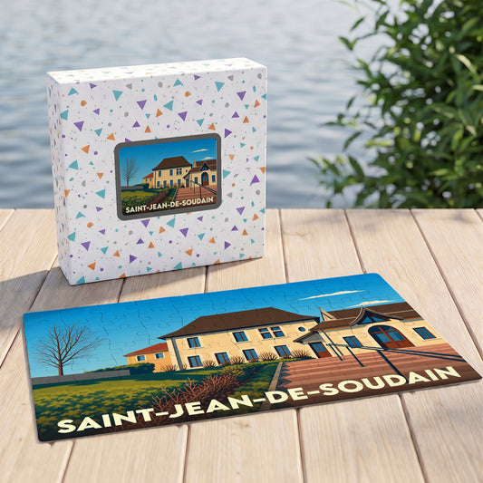 Puzzle souvenir de la ville de Saint-Jean-de-Soudain avec une illustration stylisée de sa mairie.
