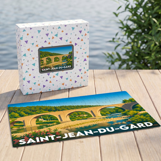 Puzzle souvenir de la ville de Saint-Jean-du-Gard avec une illustration stylisée d'un pont en pierre.