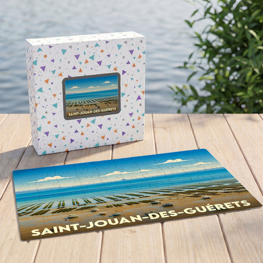 Puzzle souvenir de la ville de Saint-Jouan-des-Guérets avec une illustration stylisée de son paysage côtier.
