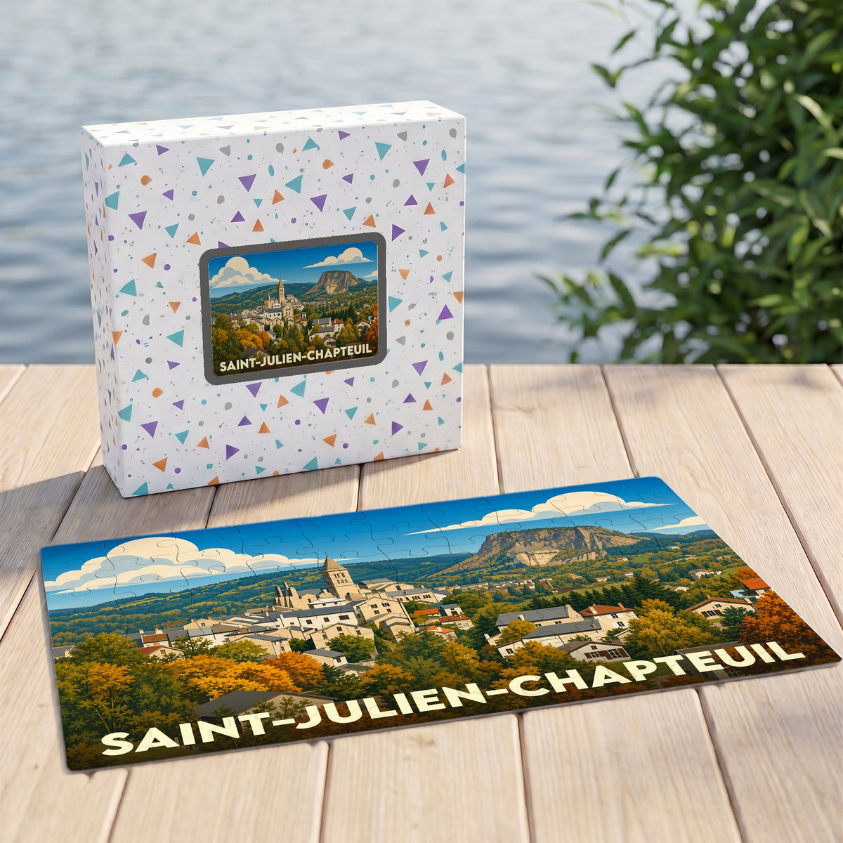 Puzzle souvenir de la ville de Saint-Julien-Chapteuil avec une illustration stylisée de son paysage et de son église.