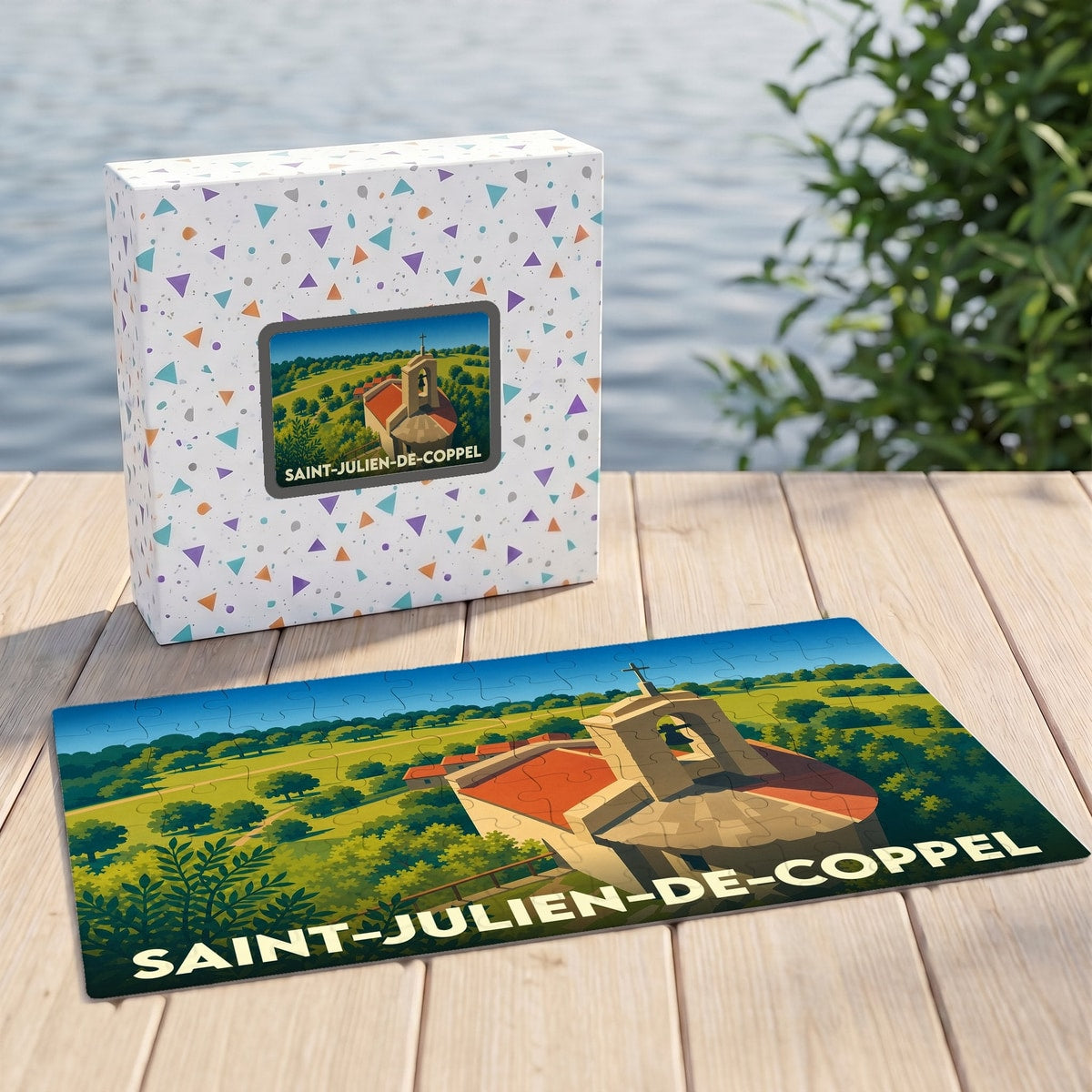 Puzzle souvenir de la commune de Saint-Julien-de-Coppel avec une illustration stylisée de son église et de ses paysages.