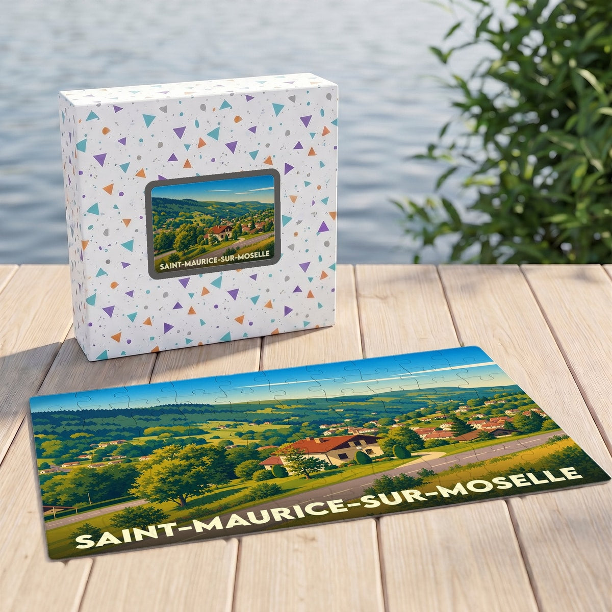 Puzzle souvenir de la ville de Saint-Maurice-sur-Moselle avec une illustration paysagère stylisée.