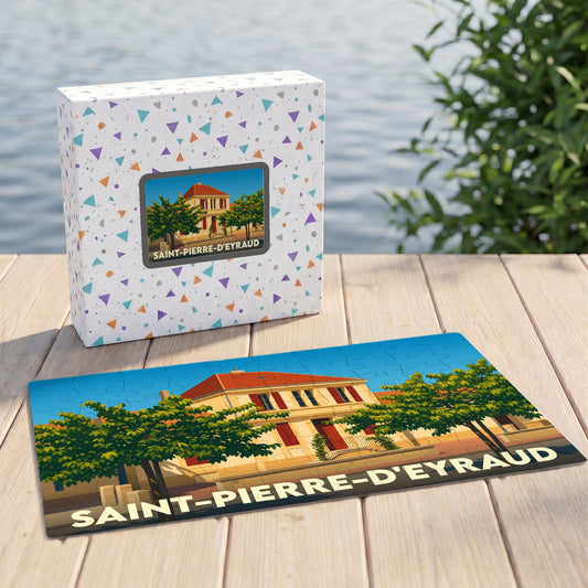 Puzzle souvenir de la ville de Saint-Pierre-d'Eyraud avec une illustration stylisée d'un bâtiment communal.