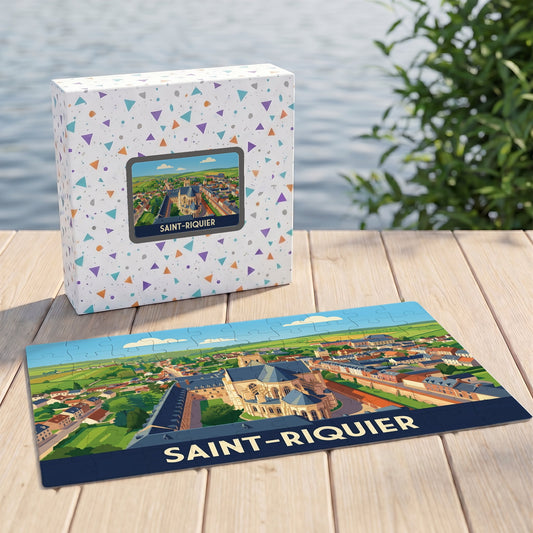 Puzzle souvenir de la ville de Saint-Riquier avec une illustration stylisée de son abbaye et de ses environs.