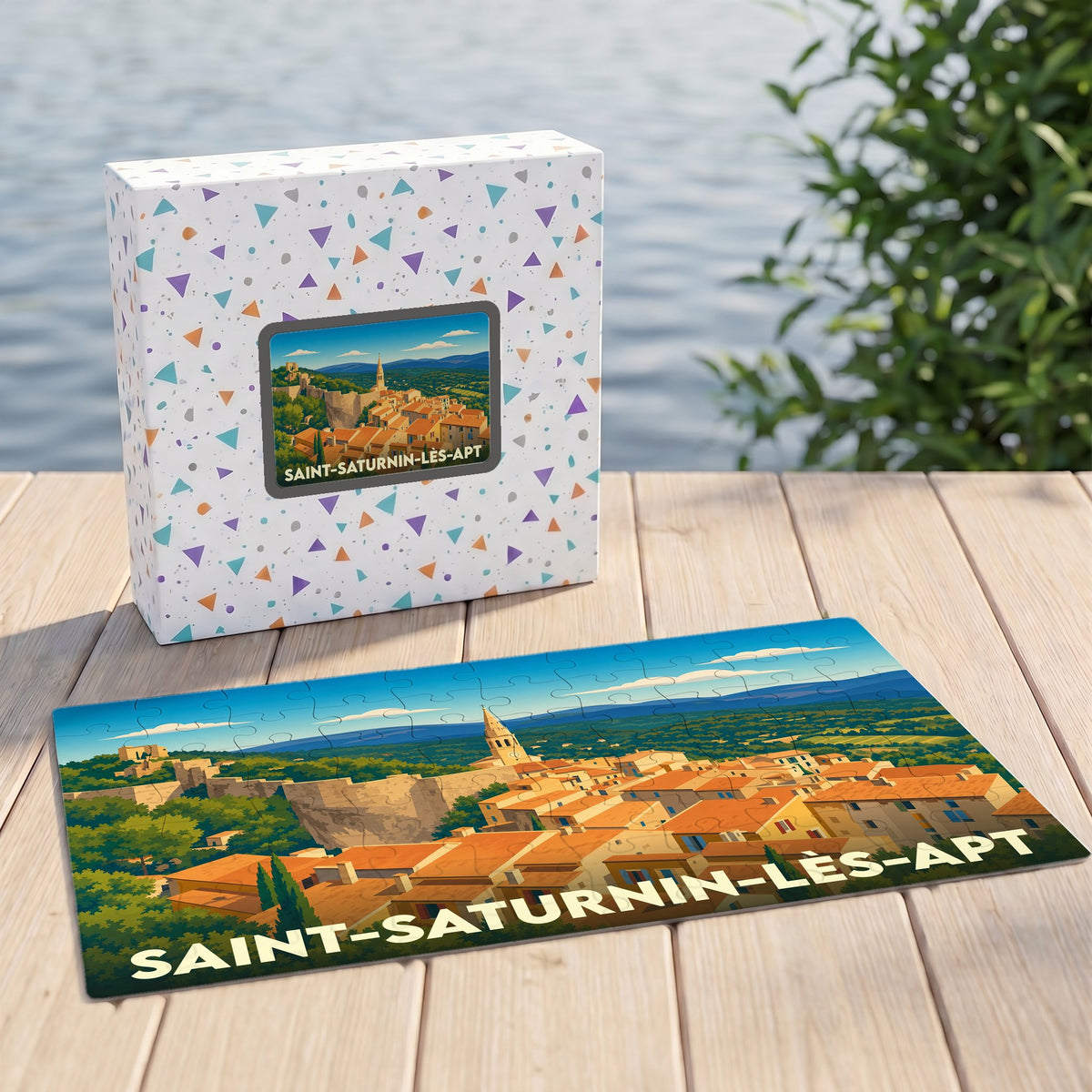 Puzzle souvenir de la ville de Saint-Saturnin-lès-Apt présentant une illustration stylisée et colorée de son paysage provençal.
