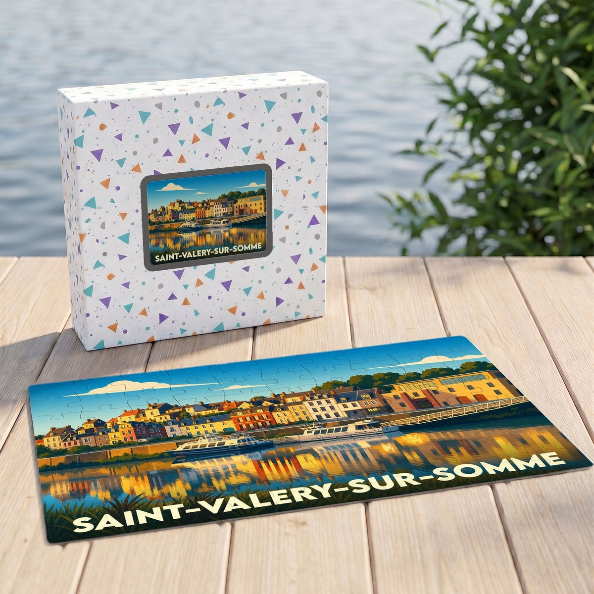 Puzzle souvenir de la ville de Saint-Valery-sur-Somme avec une illustration colorée du port et de ses reflets.