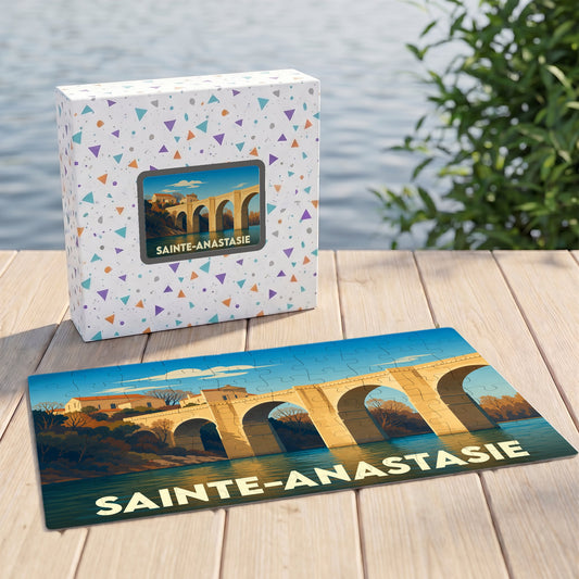 Puzzle souvenir de la ville de Sainte-Anastasie avec une illustration stylisée d'un pont en pierre.