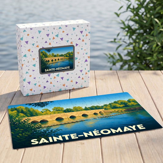 Puzzle souvenir de la ville de Sainte-Néomaye illustrant son pont historique sur une boîte et un puzzle assemblé.