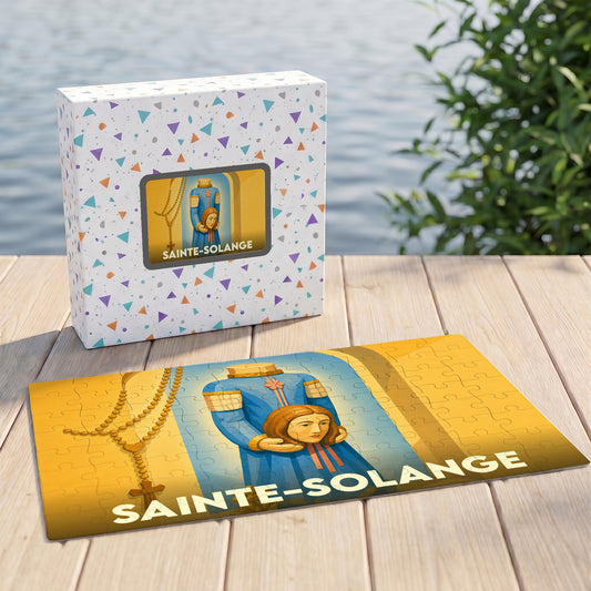 Puzzle souvenir de la ville de Sainte-Solange représentant la sainte tenant sa propre tête.