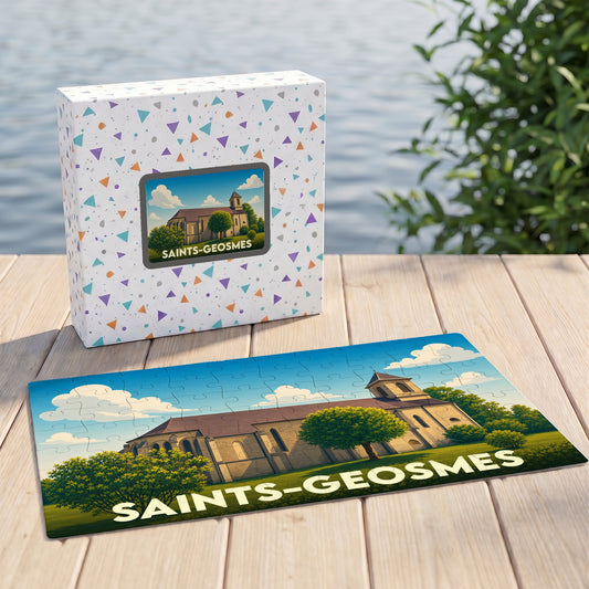 Puzzle souvenir de la ville de Saints-Geosmes avec une illustration stylisée de son église sur sa boîte et ses pièces assemblées.