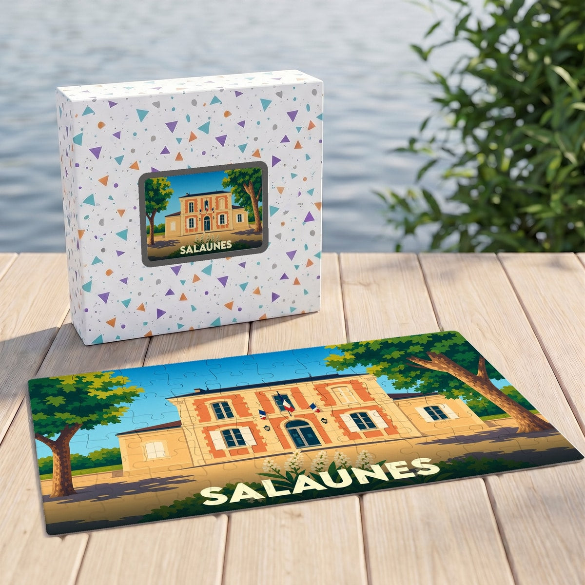 Puzzle souvenir de la ville de Salaunes présentant une illustration stylisée de sa mairie.