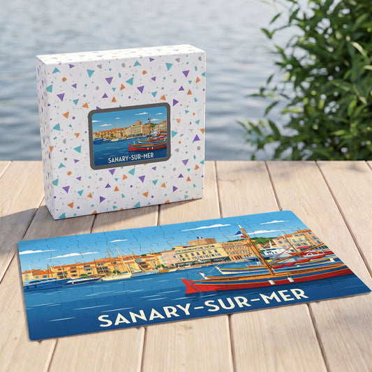 Puzzle souvenir de la ville de Sanary-sur-Mer avec une illustration stylisée de son port.