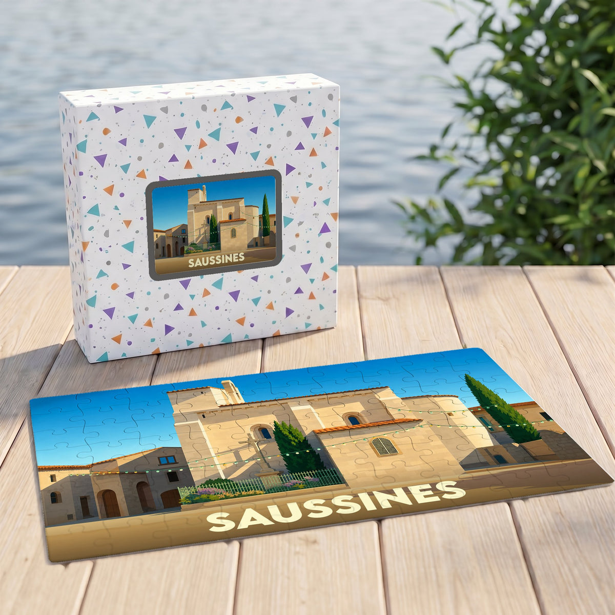Puzzle souvenir de la ville de Saussines avec une illustration stylisée de son église et de ses bâtiments typiques.