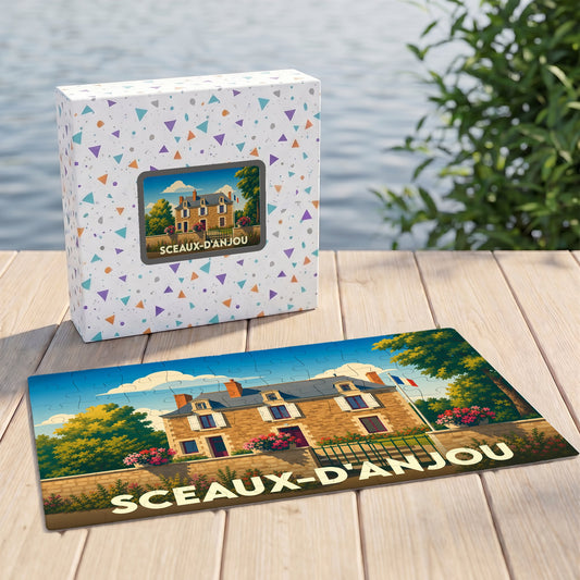 Puzzle souvenir de la ville de Sceaux-d'Anjou avec une illustration stylisée d'une maison régionale.