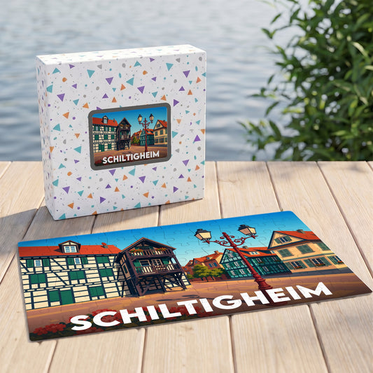 Puzzle souvenir de la ville de Schiltigheim illustré par des maisons à colombages stylisées.
