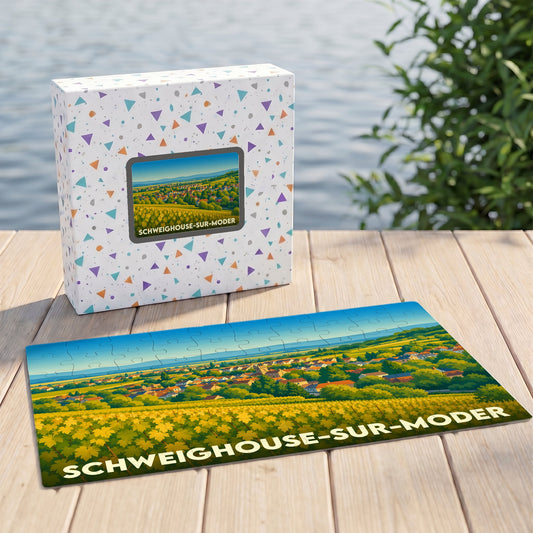 Puzzle souvenir de la ville de Schweighouse-sur-Moder avec une illustration stylisée de ses paysages et vignobles.