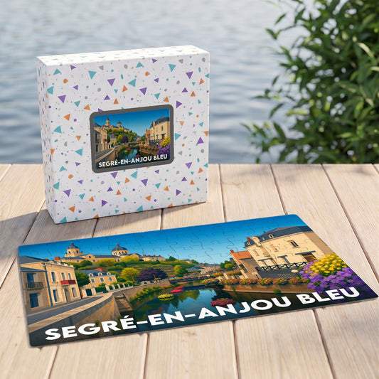 Puzzle souvenir de la ville de Segré-en-Anjou Bleu avec une illustration stylisée d'un paysage urbain au bord de l'eau.