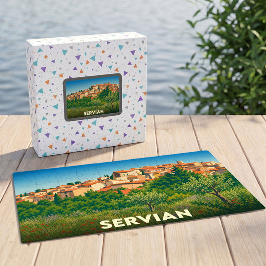Puzzle souvenir de la ville de Servian avec une illustration stylisée d'un paysage urbain provençal.