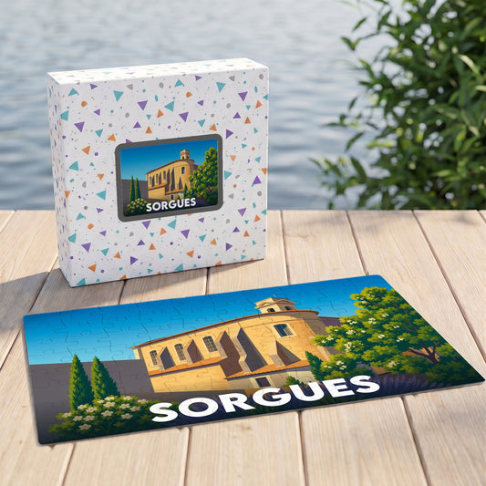 Puzzle souvenir de la ville de Sorgues avec une illustration stylisée d'un bâtiment historique et sa boîte assortie.
